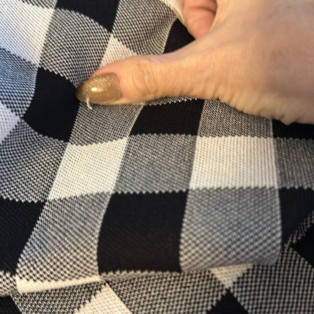 Checkered, sleeveless tunic. Very stretchy, midi length